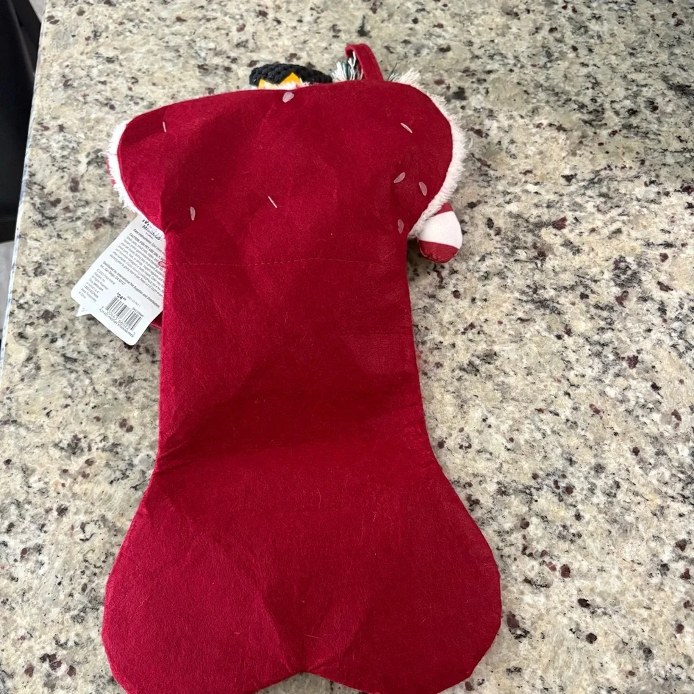 Merry Makings 4-piece dog toy set New with Tag in a red stocking